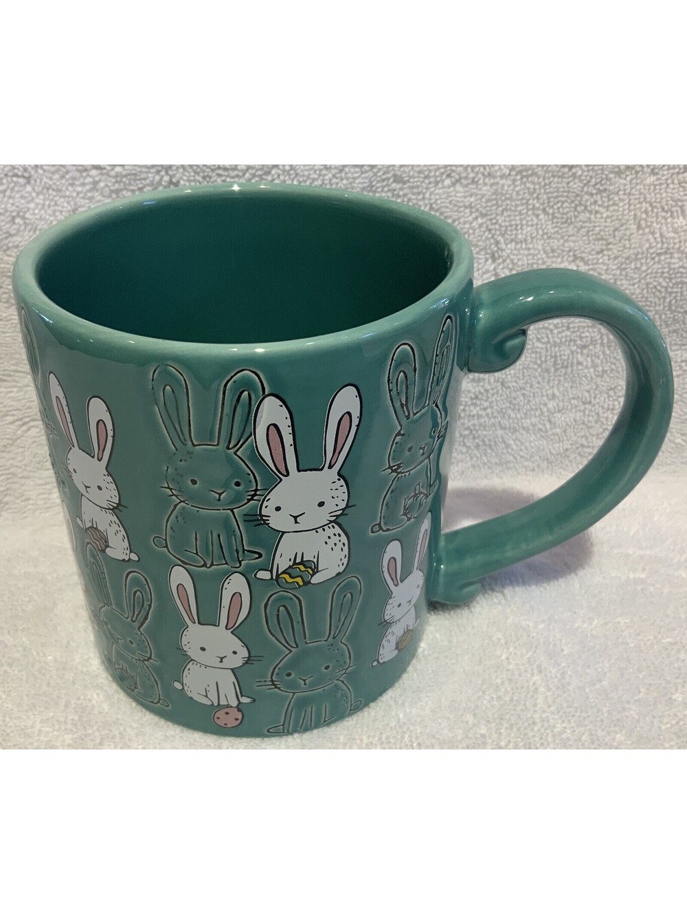 Cute Mug with Embossed Bunny’s Holding Easter Eggs